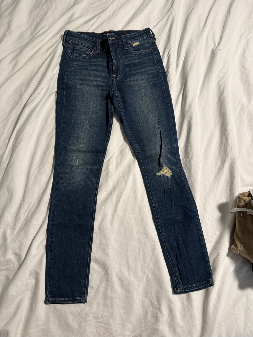 Lucky Brand Dark Blue Skinny Jeans with Distressed Knee